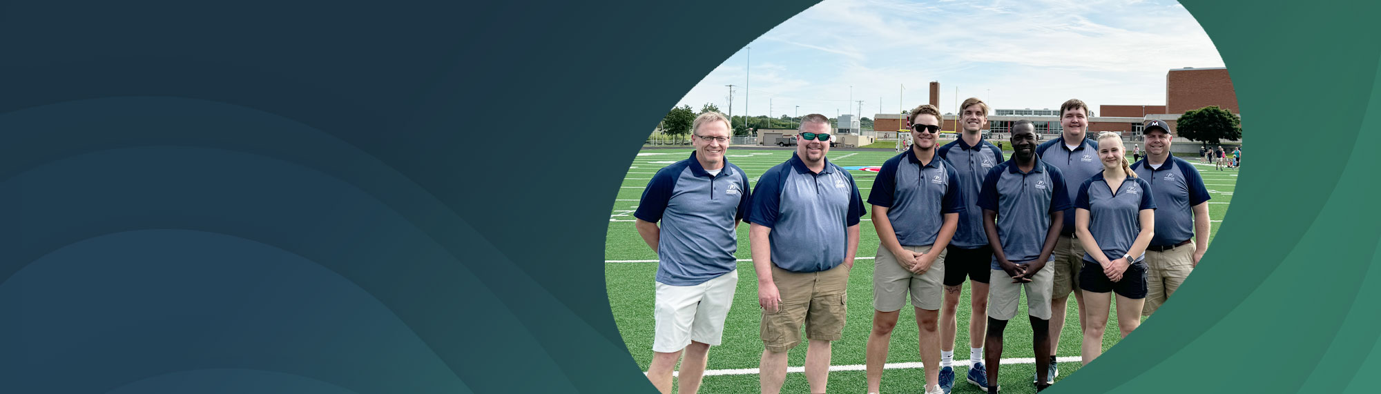 employees serving food at a kitchen